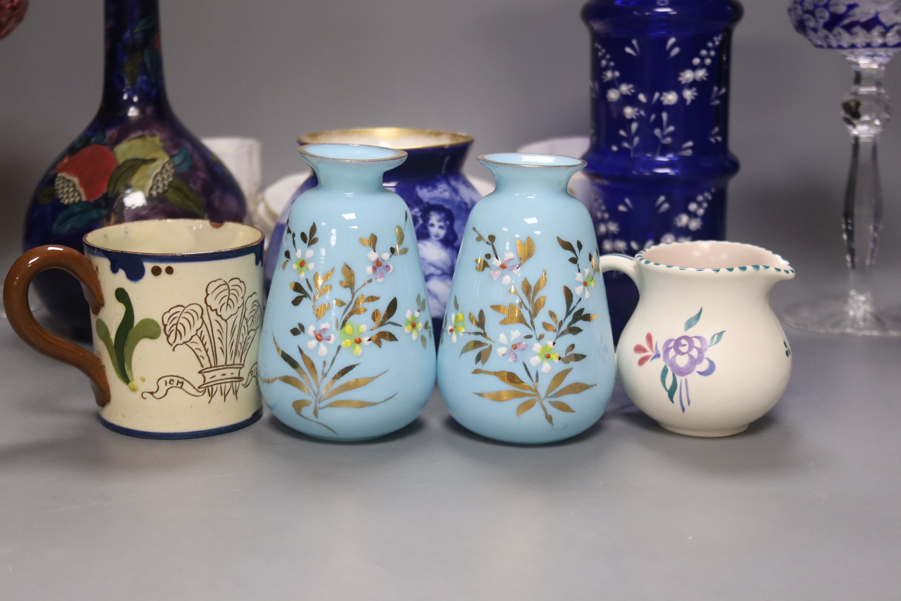 A quantity of mixed ceramics and glass including hock glasses, Doulton, Worcester, derby etc, tallest, vase blue glass vase23 cms high.